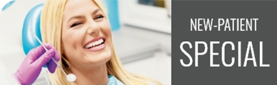 Woman smiling while at the dentist