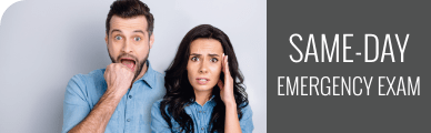 Man holding his mouth with a woman standing beside her with her hand to her forehead